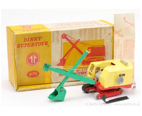 Dinky 975 Ruston Bucyrus Excavator - red base with green tinplate jib and shovel, pale yellow plastic ballast and cab (one tr