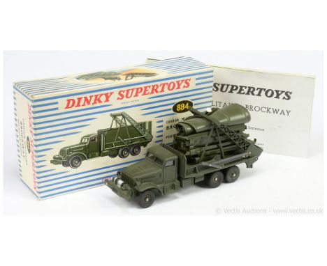 French Dinky Military 884 Brockway - drab green including concave hubs, with windows and load - overall condition is generall