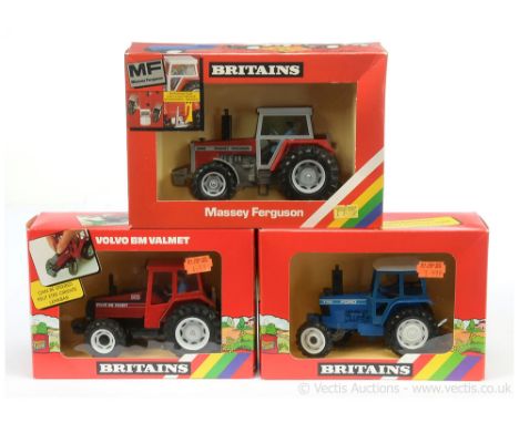 Britains 9515 Volvo Valmet 805 Tractor - red, black, white with figure driver; 9520 Massey Ferguson 2680 Tractor - red, grey,