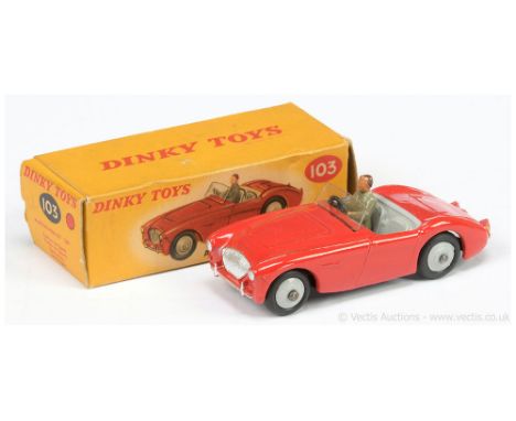 Dinky 103 Austin Healey 100 Sports Car - red body, grey interior and ridged hubs with smooth tyres, figure driver, silver tri