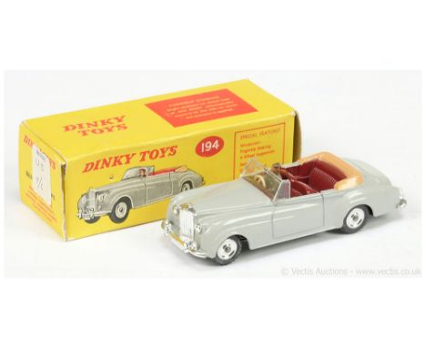 Dinky 194 Bentley Coupe - grey body, maroon interior with light tan tonneau, figure driver, chrome trim and spun hubs with tr