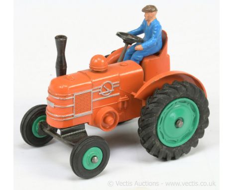 Dinky 301 (27n) Field Marshall Tractor - orange body with plastic figure driver, green wheels (plastic to front), black metal