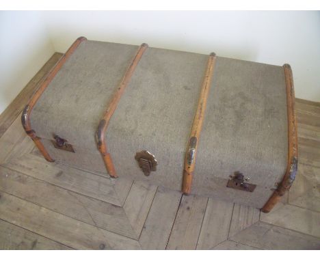 Canvas and wood bound steamer style trunk