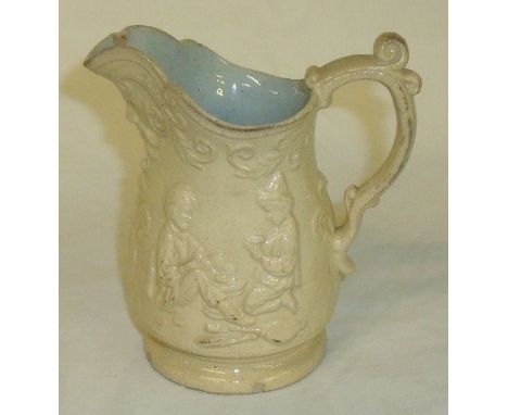 Small 19th c earthenware jug with relief moulded design depicting children playing (height 13cm)