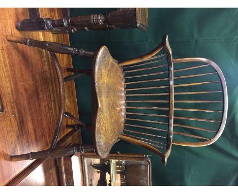 AN EARLY 19TH CENTURY STICK-BACK WINDSOR ARMCHAIR WITH CRINOLINE STRETCHER 