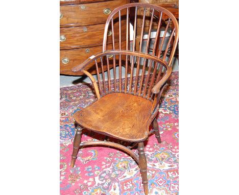 AN EARLY 19TH CENTURY STICK-BACK WINDSOR ARMCHAIR 