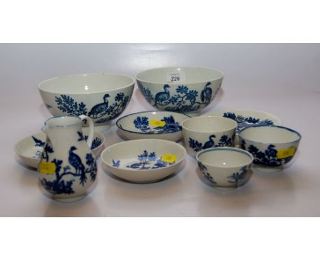 A GROUP OF WORCESTER, TRANSFER PRINTED BLUE AND WHITE, BIRDS IN A BRANCH PATTERN: A PAIR OF BOWLS 16CM, SAUCER, CREAM JUG, AN