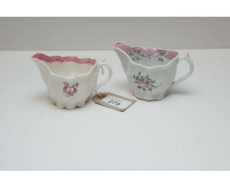 TWO CREAMERS DECORATED WITH POLYCHROME FLOWERS PROBABLY WORCESTER (11 CM ) 