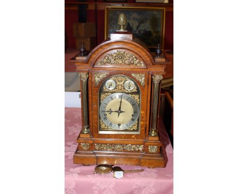 OAK CASED MANTLE CLOCK THE FACE MARKED THOMAS ARMSTRONG AND BROS. MANCHESTER. NO MAKERS MARK TO MOVEMENT, STRIKING ON A GONG.
