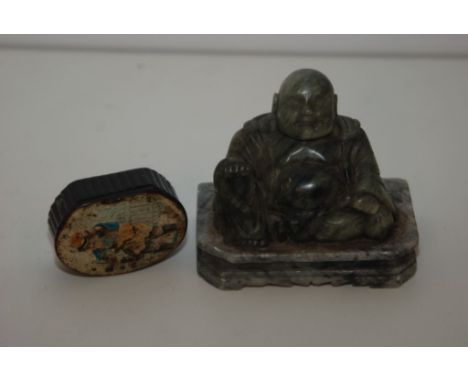 SOAPSTONE SEATED BUDDHA AND A VICTORIAN PAPIER MACHE SNUFF BOX WITH PAINTED FIGURE TO TOP 