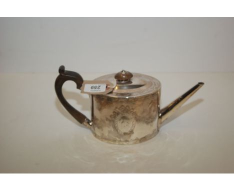 A SILVER TEAPOT OF NEO-CLASSICAL DESIGN, THE OVOID BODY ENGRAVED WITH VACANT CARTOUCHE AND LONDON ASSAY 