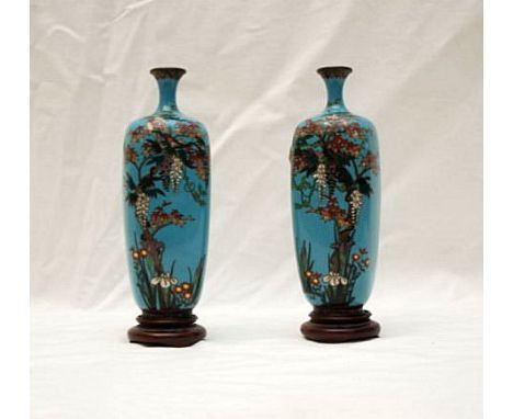 PAIR OF BLUE ENAMEL CLOISONNE VASES DECORATED WITH TREES AND FLOWERS, 15 CM 