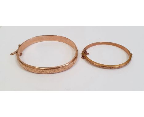 9ct gold bangle, foliate scroll heart engraved, 8g approx. and another child's bangle, scroll engraved, 3g approx. (2) 