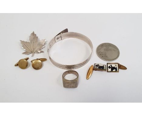 Adjustable bangle marked sterling silver, brooch in the form a maple leaf marked sterling, 1943 Tunisian ring, Made a Mason m