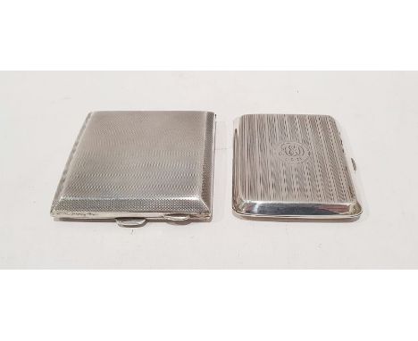 Two 20th century silver cigarette cases, one with engine-turned decoration and gilt washed interior, 6.7ozt (2) 