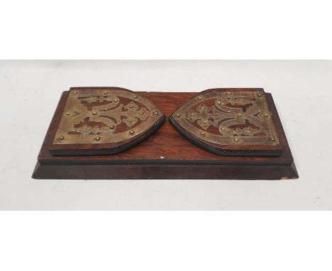 Adjustable book end trough with hinged book ends and gothic-style brass details to edges