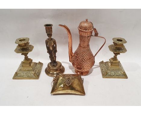 Two brass candlesticks with foliate decoration, on square bases, a brass purse with hinged lid and ornate lock on a chain, a 