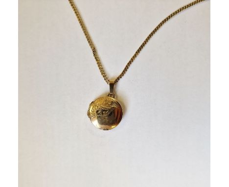 9ct gold circular locket engraved, on fine curb-link chain, 6.9g approx. total&nbsp;
