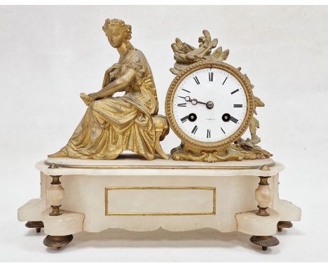 Gilt metal and alabaster clock with drum face and figure to the left on neoclassical style base with harp and book finial, st