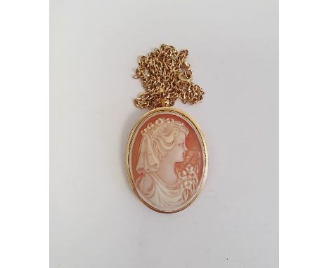 Gold-coloured carved shell cameo pendant/brooch, marks indistinct and the 9ct gold chain link necklace 