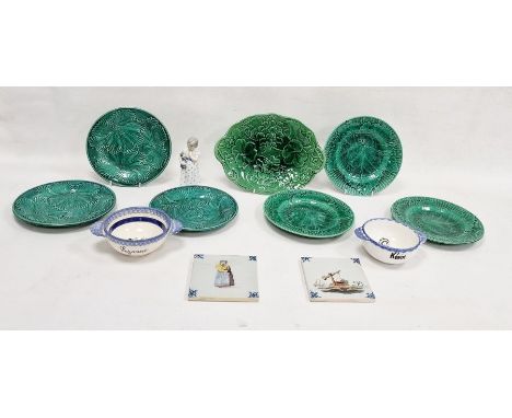 Royal Copenhagen figure of young girl holding doll, no.3539, seven various green majolica leaf mould plates, Quimper pottery 
