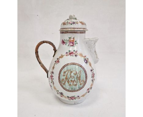 Chinese export porcelain covered jug of baluster shape with shell spout, all painted in famille rose colours with floral bord