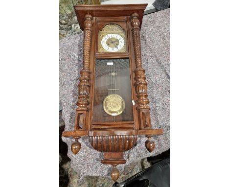 Early 20th century Vienna regulator type clock in mahogany case with ring turned columns, Arabic numerals on ceramic chapter 