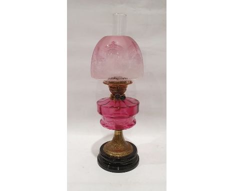 Duplex paraffin lamp with pink glass shade and well, brass body and on a circular base, approx. 58cm&nbsp;Condition ReportSom