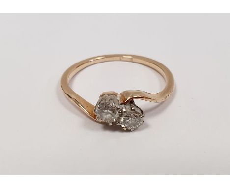 18ct gold and two-stone diamond crossover ring  size 'M'Condition ReportWeight approx. 1.8g ring size 'M'