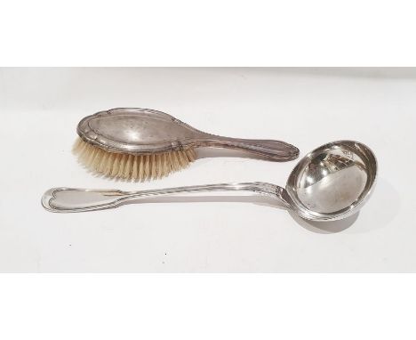 Silver-backed dressing table brush and an electroplated ladle by Christofle (2) 