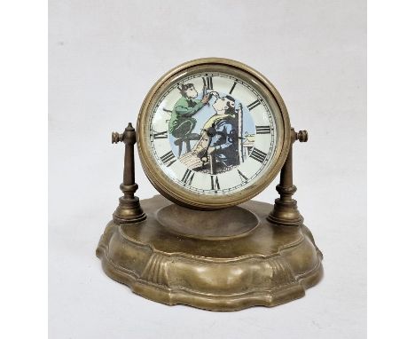 Mantle clock&nbsp;with the drum face with humorous barber image and ticking arm,&nbsp; on circular plinth with ticking face, 