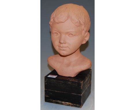 An early 20th century terracotta head and shoulders portrait bust of a girl, on plinth base, h.35cm