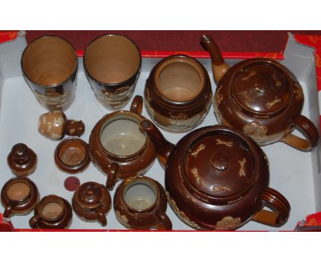 A collection of Victorian Royal Doulton salt-glazed stoneware teawares, to include teapot and cover, together with a silver m