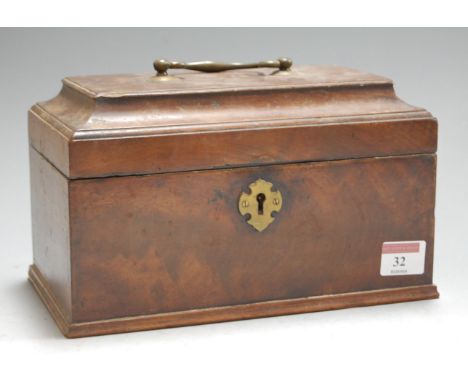 A George III mahogany tea caddy, having cavetto moulded hinged lid opening to reveal later baize lined interior, w.24cm