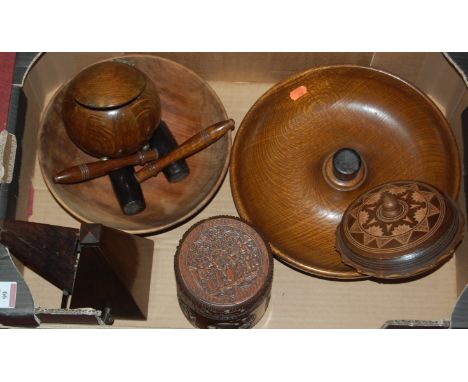 A box of miscellaneous items, to include a walnut cased metronome, oak biscuit barrel etc
