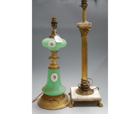An early 20th century green glass and gilt metal mounted pedestal table lamp, having central portrait medallion and Greek Key