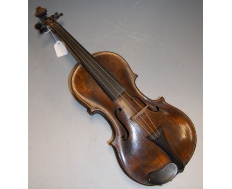 A late 19th century continental violin having ebonised finger board, one piece back, in fitted carry case, 36cm (excluding bu