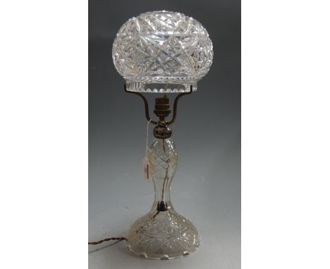 An early 20th century cut glass table lamp, having mushroom shaped shade, h.43cm