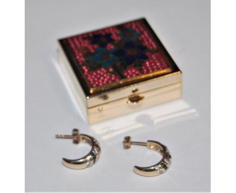 the half hoop earrings set with alternating rows of sapphires and white hardstones, fitted with posts for pierced ears with i