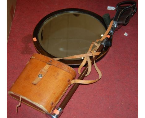 A modern shooting stick; together with a cased pair of binoculars; and a mahogany wall mirror (3)