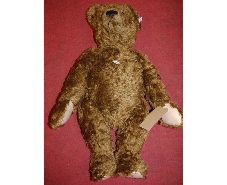 A large Steiff teddy 1907 Brown 70, with white button to ear, numbered 03702, with box and certificate Condition: Appears in 