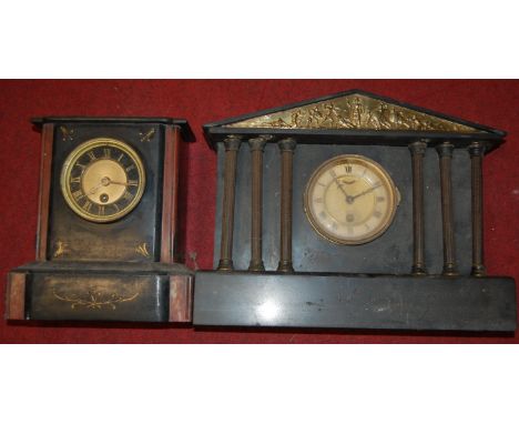A late Victorian black slate mantel clock; together with one other similar architectural example (a/f) (2)