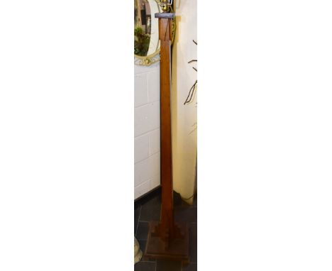 An Art Deco standard lamp with applied stepped decoration on plinth base, height 151cm.