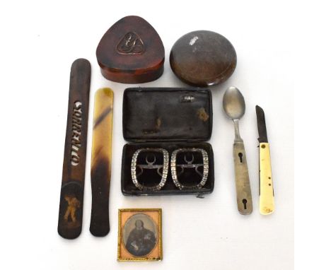A pair of cased Georgian shoe buckles, a Victorian daguerreotype depicting a seated lady wearing a black cloak, and further c