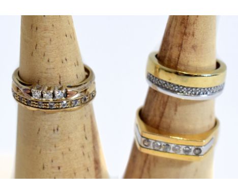 Three 9ct yellow gold dress rings and a further yellow and white metal example set with six clear stones, size S, approx 12g 