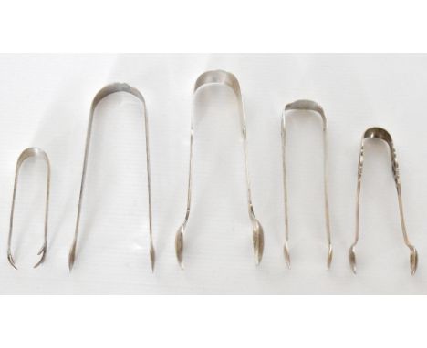 Five pairs of Georgian and later hallmarked silver sugar tongs, including an example with bright cut details and engraved ini