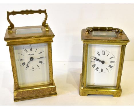 ANGELUS; a modern French brass cased carriage clock, the enamel dial set with Roman and Arabic numerals, height including swi