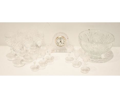 WATERFORD; a cut glass footed bowl, diameter 20cm, and twelve assorted glasses and a Galway crystal mantel clock (14).Additio