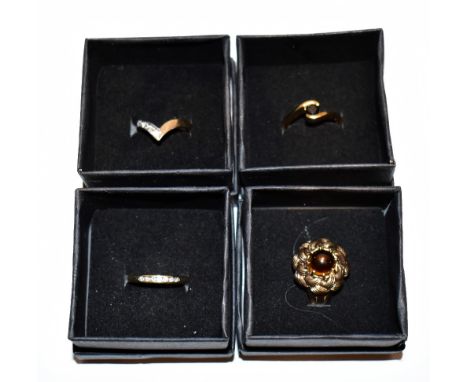 Four 9ct yellow gold dress rings including an example set with seven white coloured stones, size N 1/2, approx 13.6g.Addition