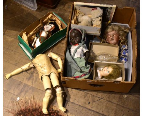 ARMAND MARSEILLE; a German bisque headed doll with articulated limbs, a plaster doll's head fitted in original box 'The Winde